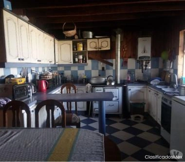 PROPIEDAD COMERCIAL, CASA CON CABAÑA Y AMPLIO TERRENO 610 m2